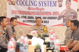 Wujudkan Pilkada 2024 Sejuk, Kapolres Rohul Bergerilya Cooling System Dengan Pendeta HKBP, Katolik Dan Pemdes Ujungbatu Timur 