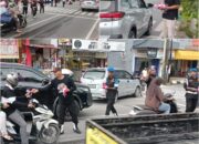 Dumai Membara Merah Putih, GRIB Jaya Bagikan Ribuan Bendera ke Pengendara