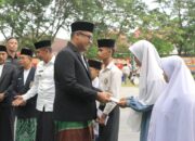 Semangat Santri Membangun Negeri, Kapolres Kampar Hadir di Upacara HSN, Sampaikan Pesan Inspiratif, Dukung Santri Mengawal Indonesia!