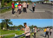 Polsek Bukit Kapur Perkuat Sinergi Tiga Pilar, Gotong Royong Massal Bersihkan Jalur Exit Tol Bukit Kapur