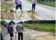 Polsek Sungai Sembilan Gerak Cepat Bersihkan Tumpahan CPO, Selamatkan Pengguna Jalan dari Ancaman Kecelakaan