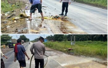Polsek Sungai Sembilan Gerak Cepat Bersihkan Tumpahan CPO, Selamatkan Pengguna Jalan dari Ancaman Kecelakaan